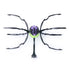 HEX BOTS Skitter Bot spider toy in purple and neon green molded plastic with segmented body and eight black jointed legs spread wide, shown from a top view on a white studio surface. |