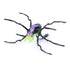 HEX BOTS Skitter Bot remote control spider in purple and neon green molded plastic with flexible black legs and red eye accents, displayed in a dynamic crawling pose on a white background.