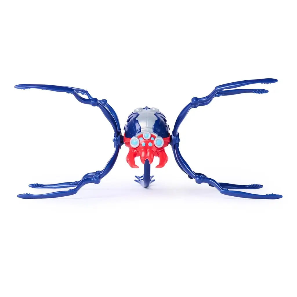 HEX BOTS Skitter Bot spider toy in navy blue and red molded plastic with wide-spread jointed legs and glowing blue sensor eyes, centered in a front-facing view against a white backdrop.