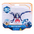 HEX BOTS Skitter Bot remote control spider in navy blue and bright red molded plastic with eight jointed legs and light blue sensor eyes, displayed in clear retail packaging with logo and warning label.
