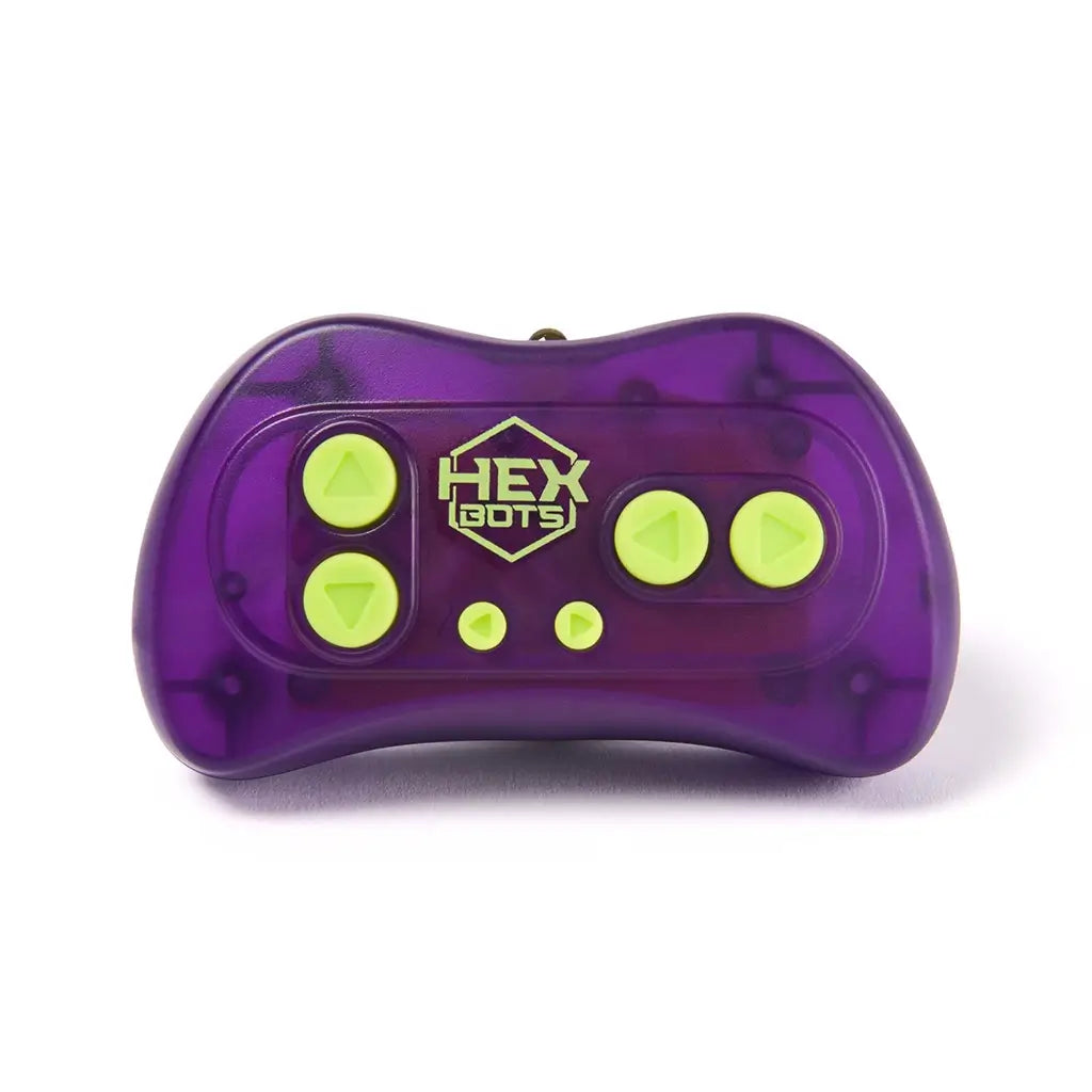 HEX BOTS remote control in translucent purple plastic with lime green directional buttons and logo center, compact curved shape designed to operate the Wall Crawler gecko toy.