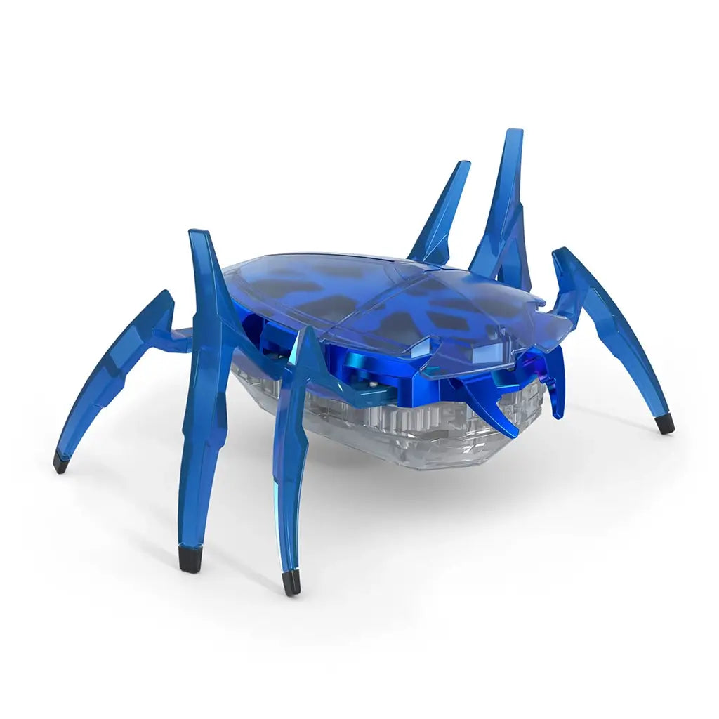 Hex Bots blue scarab robot toy made of translucent plastic with angular shell and six segmented legs, compact motorized design built for quick flipping motion, isolated on clean white background