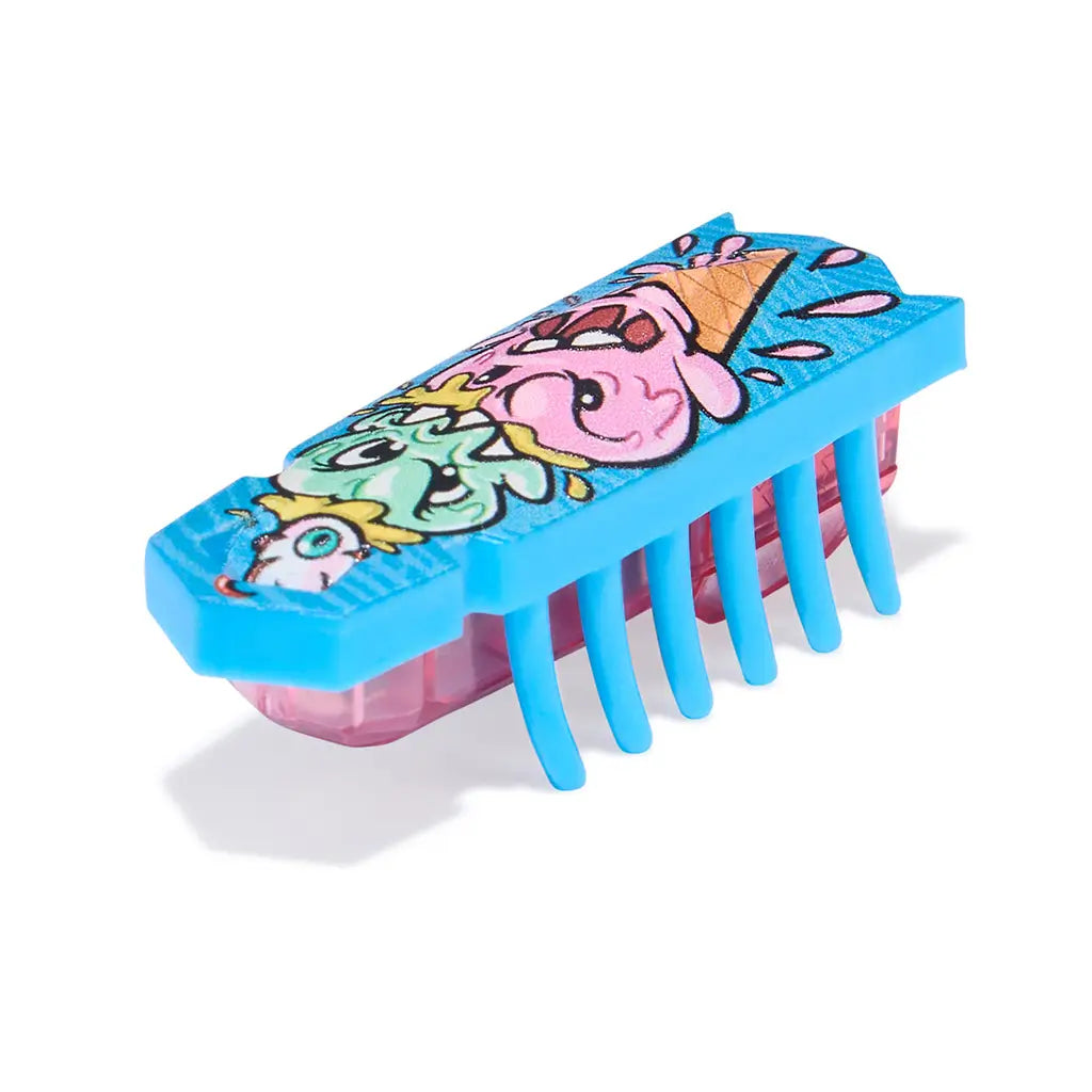 HEXBUG Nano robot bug angled view in bright blue plastic with detailed ice cream character graphic, low-profile rectangular body and flexible legs, designed for interactive vibrating play on a white backdrop.