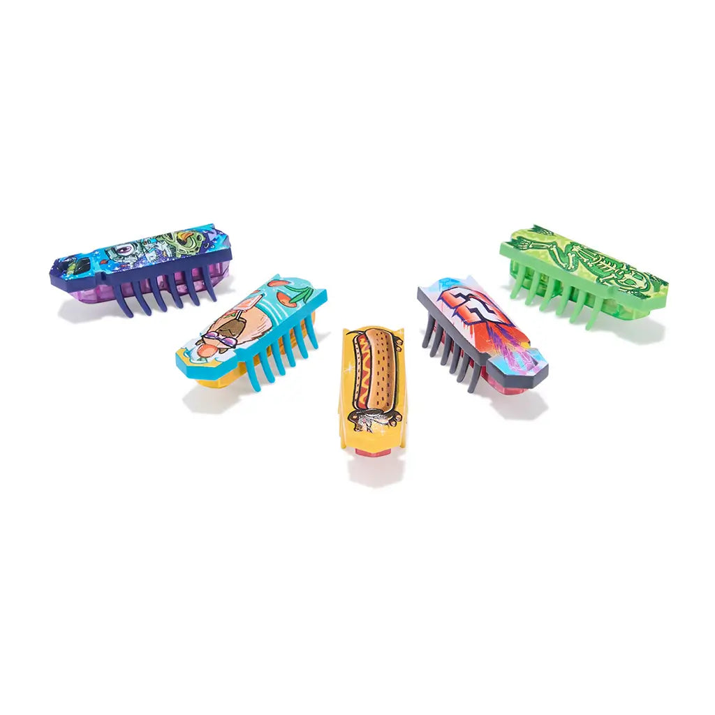 HEXBUG Nano robot bug collection in bright multicolor plastic bodies with comb-like legs, compact rectangular shapes designed for scurrying play, arranged in a fan layout on a clean white background.