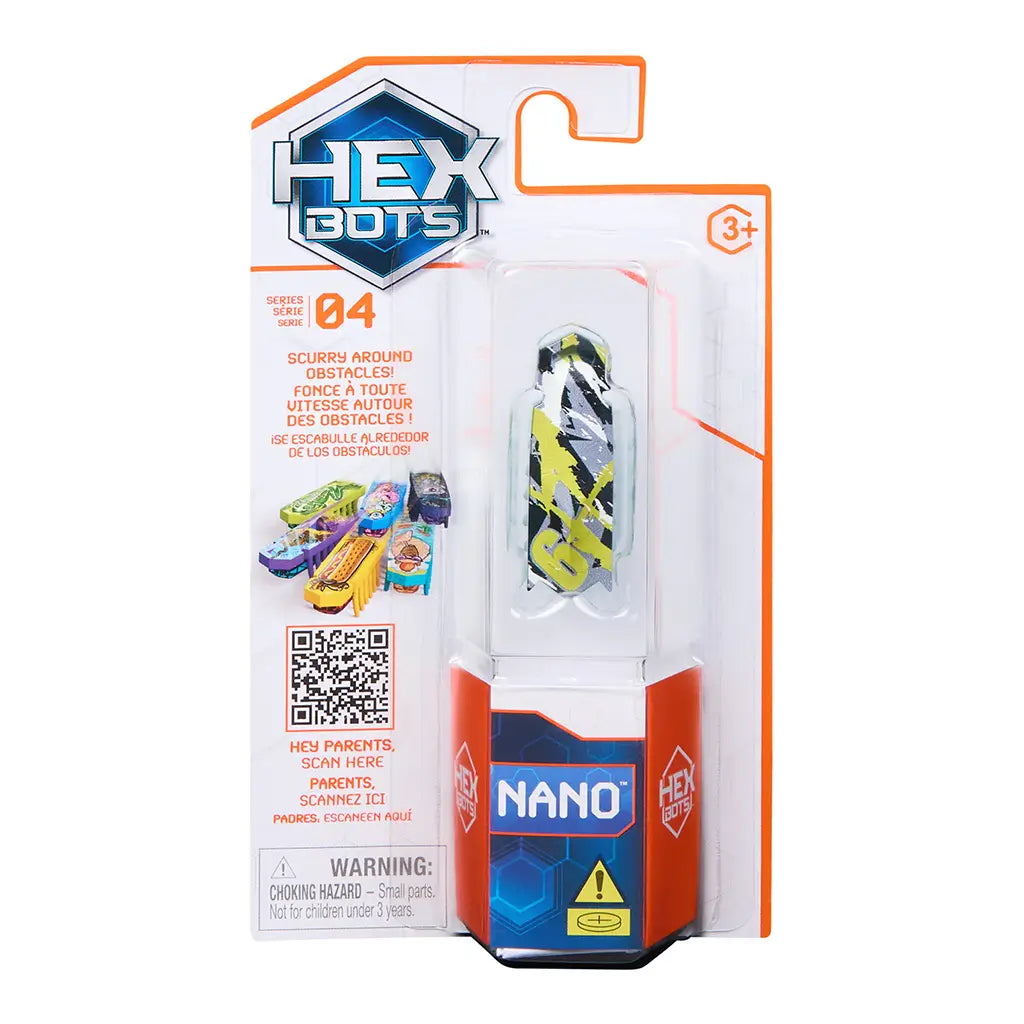 HEXBUG Nano toy packaging in white cardboard and clear plastic blister, tall rectangular form featuring green camo graphic robot bug, retail branding, QR code, and warning label on a clean studio background.