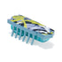 HEXBUG Nano robot bug in green camo, gray, and black plastic with textured graphic top, compact rectangular body and multiple rubber legs, designed for vibrating movement on a neutral white surface.