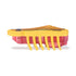 HEXBUG Nano robot bug side view in yellow plastic with translucent red base, low rectangular body and evenly spaced rubber legs, designed for quick vibrating motion on a clean white background.