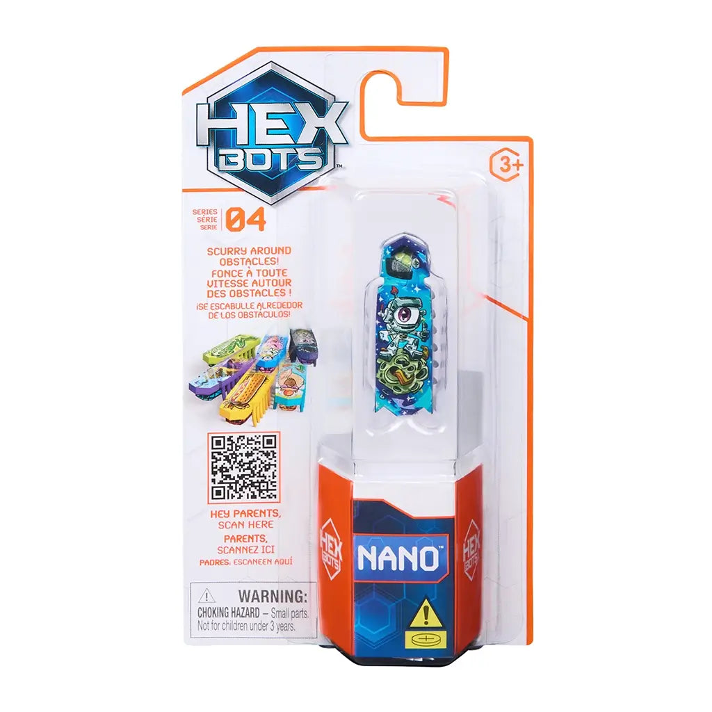 HEXBUG Nano toy packaging in white cardboard and clear plastic blister, tall rectangular form displaying a blue one-eyed robot bug, retail branding, QR code, and safety label on a clean studio background.