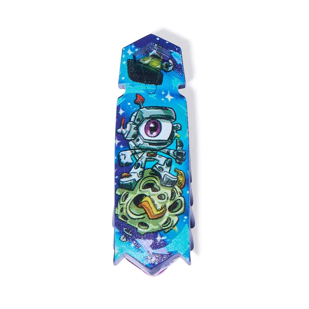 HEXBUG Nano one-eyed robot bug in blue and green glossy plastic, slim rectangular body with angled tip, detailed cartoon graphic, designed as a vibrating micro robot toy on a plain white background.
