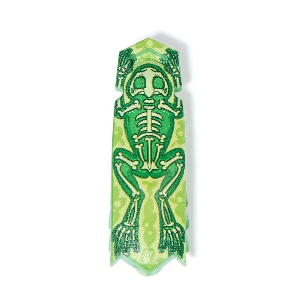 HEXBUG Nano toy robot bright green plastic shell with skeleton frog graphic on top and translucent base, shown in a slim elongated insect-like form with multiple flexible legs for fast movement on white background