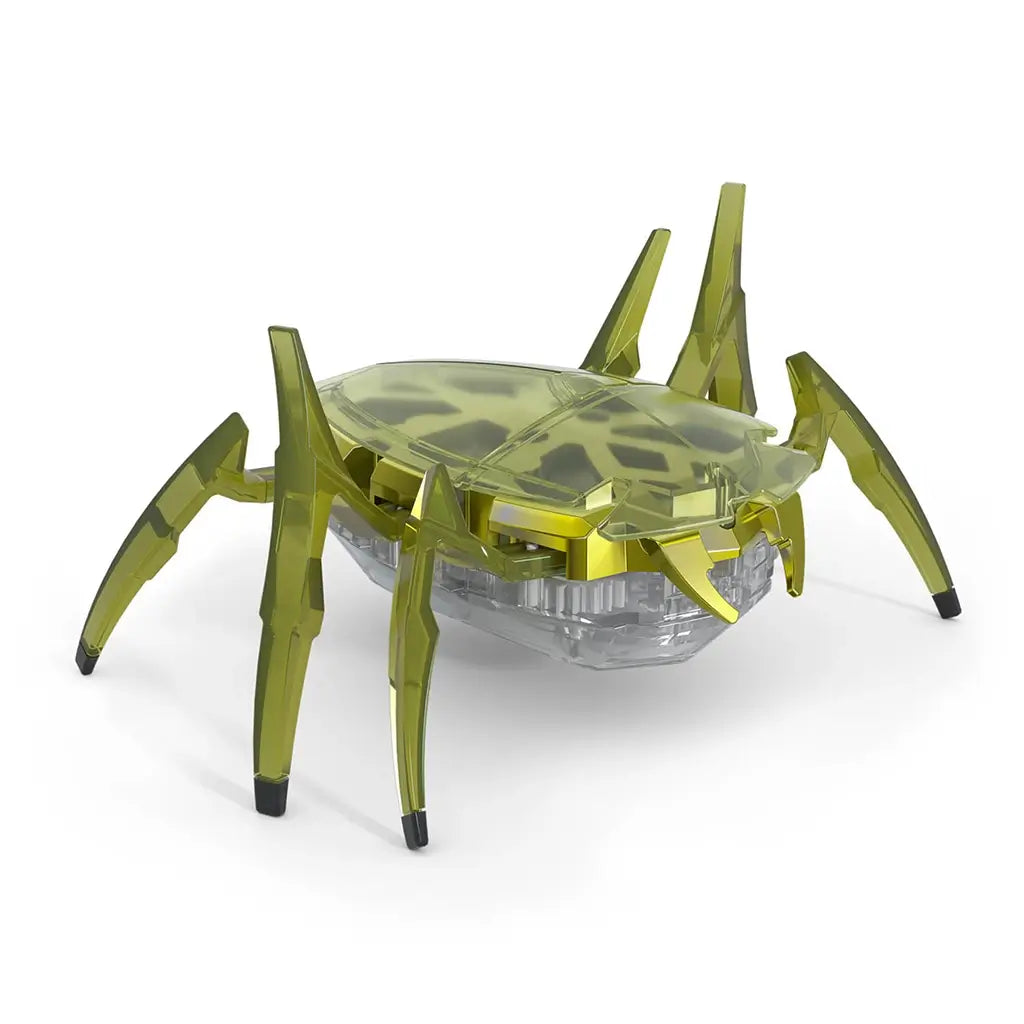 Hex Bots yellow scarab robot toy made of translucent plastic with angular shell and six segmented legs, compact motorized design built for quick flipping motion, isolated on clean white background