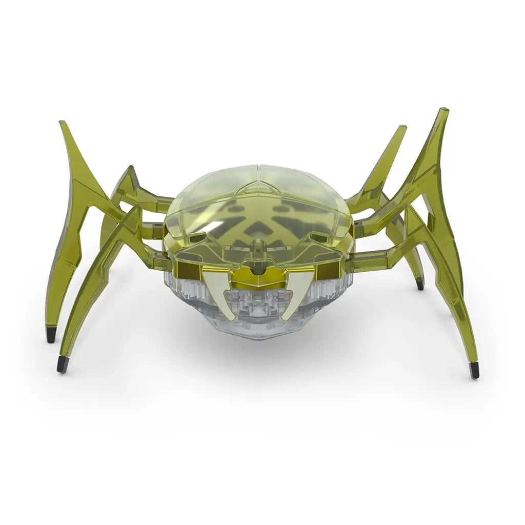 Hex Bots scarab robot in yellow translucent plastic with low-profile oval shell and symmetrical six-leg structure, motorized toy designed for rapid flipping action, centered on white background