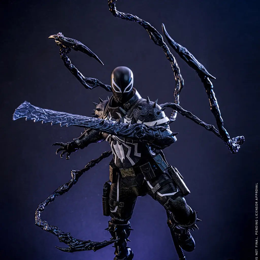 Hot Toys Agent Venom figure in black textured armor with white spider emblem, wielding a symbiote blade as glossy tendrils spread across a dark blue backdrop.