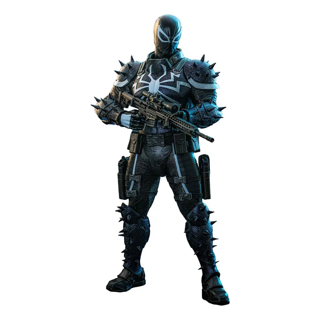 Hot Toys Agent Venom figure in black textured armor with white spider emblem, spiked pads, and rifle, standing in a full-body pose against a clean white background.