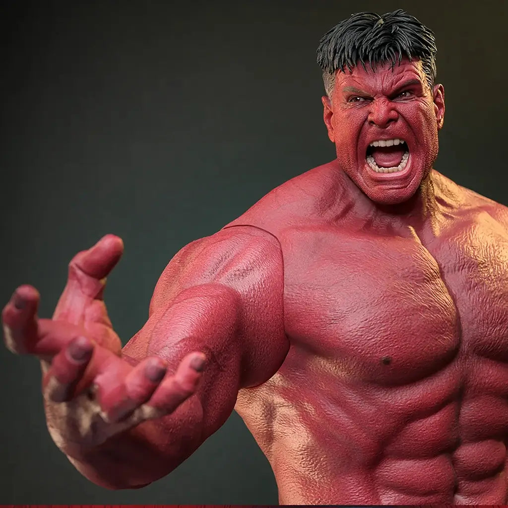Red Hulk Hot Toys figure features textured red skin, a broad muscular torso, black sculpted hair, an open roaring mouth, and an interchangeable reaching hand against dark gray.