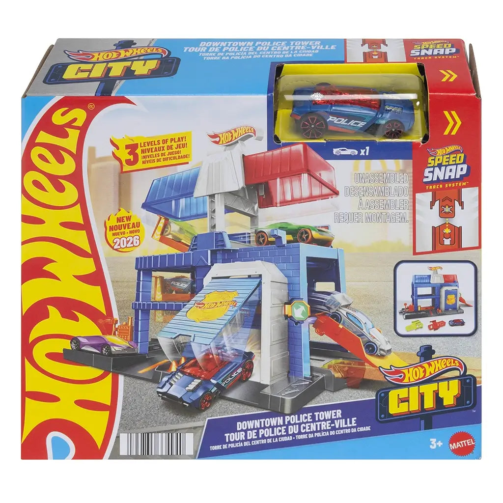 Hot Wheels City Downtown Police Tower retail box front featuring illustrated blue tower playset, police car, action ramps, Speed Snap track icons, age guidance, and bright branded packaging graphics.