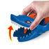 Close-up of Hot Wheels City Nemesis Shark Launcher toy with a hand lifting the blue shark’s jaws, showing interactive chomping action and orange lever inside mouth.