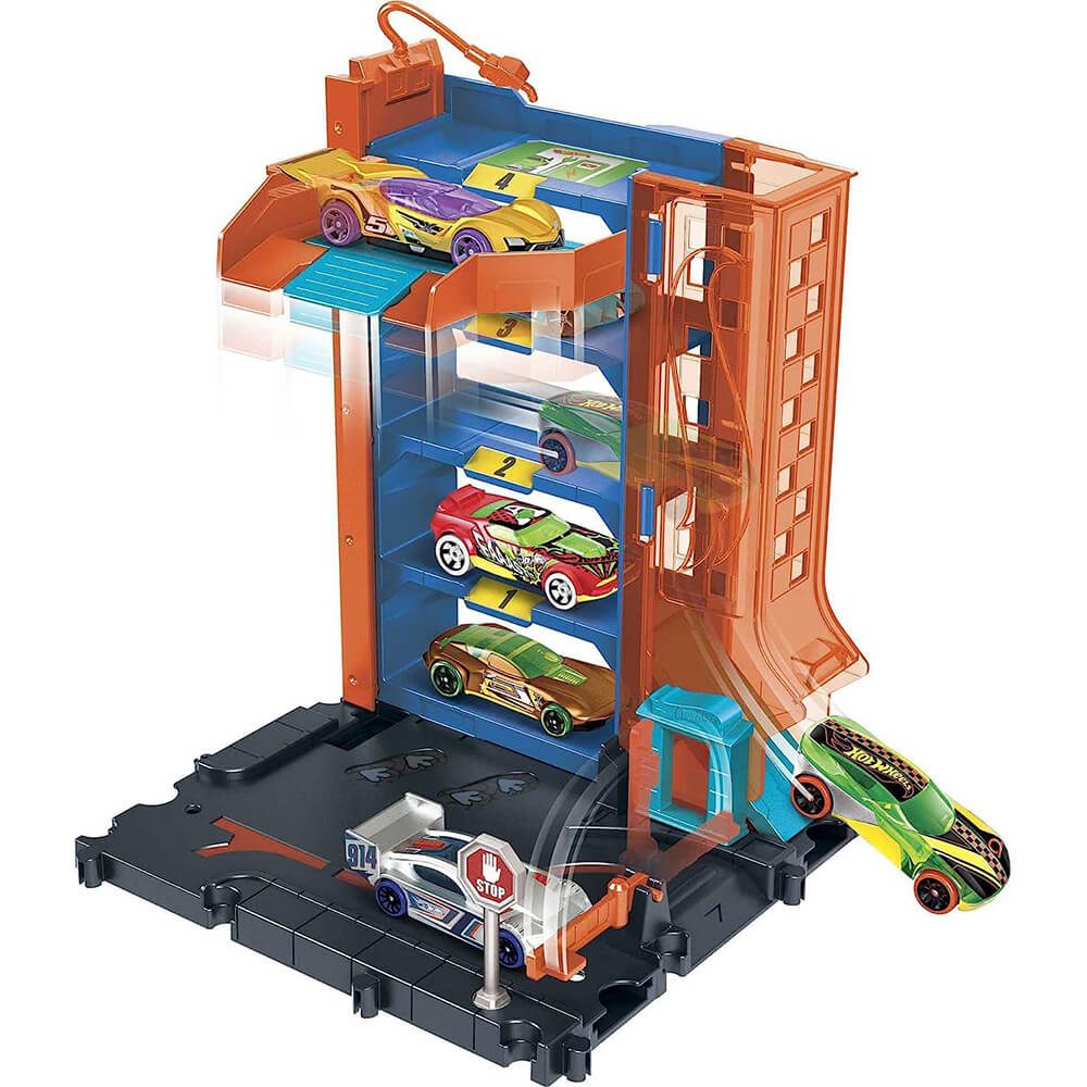 Hot Wheels City Parking Garage Playset with cars in motion