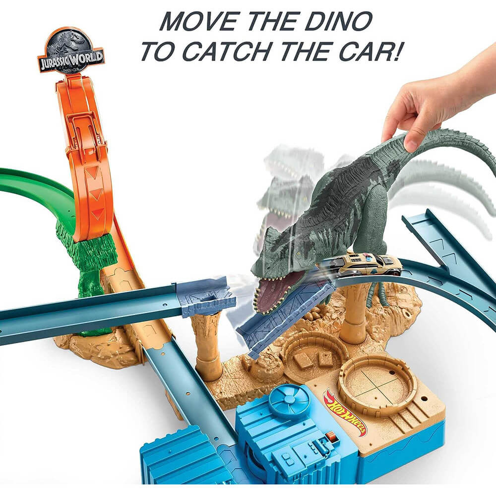 Move the dino to catch the car in the Hot Wheels Jurassic World Clash 'n Crash Track Set