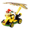 Front angled view of Hot Wheels Mario Kart Bowser diecast toy car with Bowser figure, yellow kart, green trim, and kite-shaped glider wing with Bowser’s emblem design.