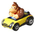 Angled close-up of Hot Wheels Donkey Kong Sports Coupe diecast car highlighting yellow body, black bumper details, silver wheels, and sculpted Donkey Kong character.