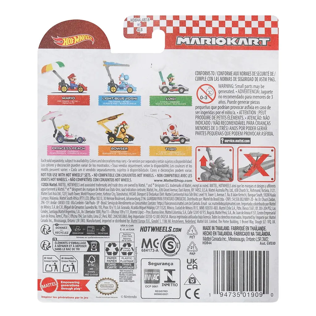 Back packaging of Hot Wheels Mario Kart Light-Blue Yoshi diecast toy shows collectible lineup with Mario, Luigi, Peach, Bowser, and Toad, plus safety warnings and Mattel branding in multiple languages.