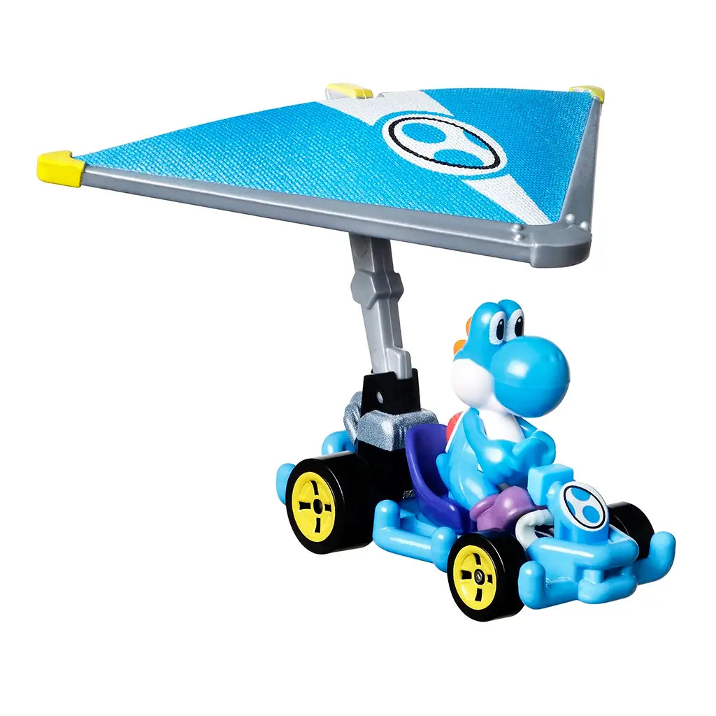 Hot Wheels Light-Blue Yoshi Mario Kart diecast car with blue kart body, purple seat, yellow wheels, and silver super glider wing, designed for collectors and fans of Nintendo’s racing franchise.