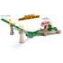 Hot Wheels Mario Kart Piranha Plant track set in action with labeled gravity launcher and moving chomping plant as cars race down the bright green track toward the obstacle.