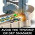 Hot Wheels Mario Kart Thwomp Ruins track set shows Luigi in a green kart narrowly avoiding a crashing gray Thwomp block on a castle-style race track with text warning of danger.