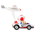 Side view of Hot Wheels Mario Kart Toad diecast car shows aerodynamic white kart with black wheels, red trim, and tall rear-mounted red and white glider attachment.