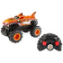 Hot Wheels Tiger Shark RC monster truck with black treaded tires and orange shark-themed body, displayed alongside its black remote controller with two large red buttons.