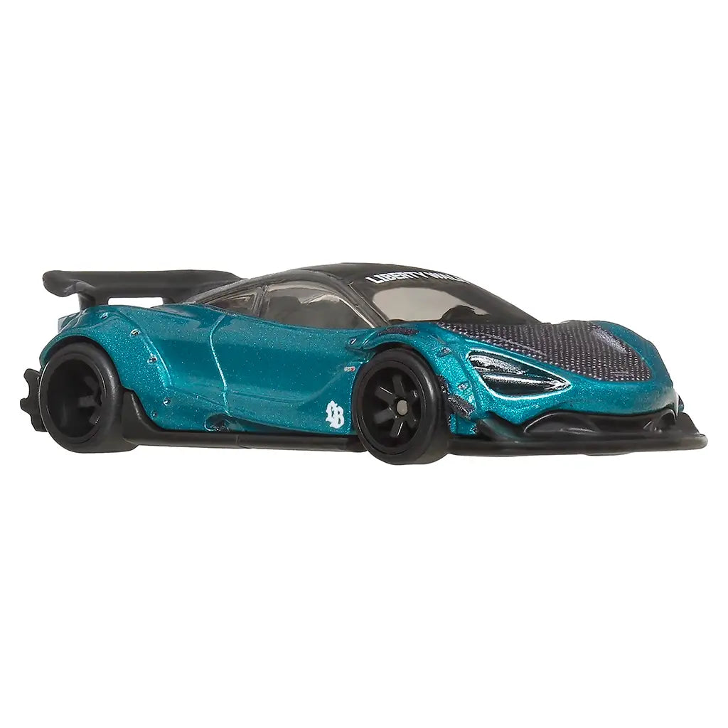 Front angle view of a Hot Wheels teal toy car with black accents on a white background