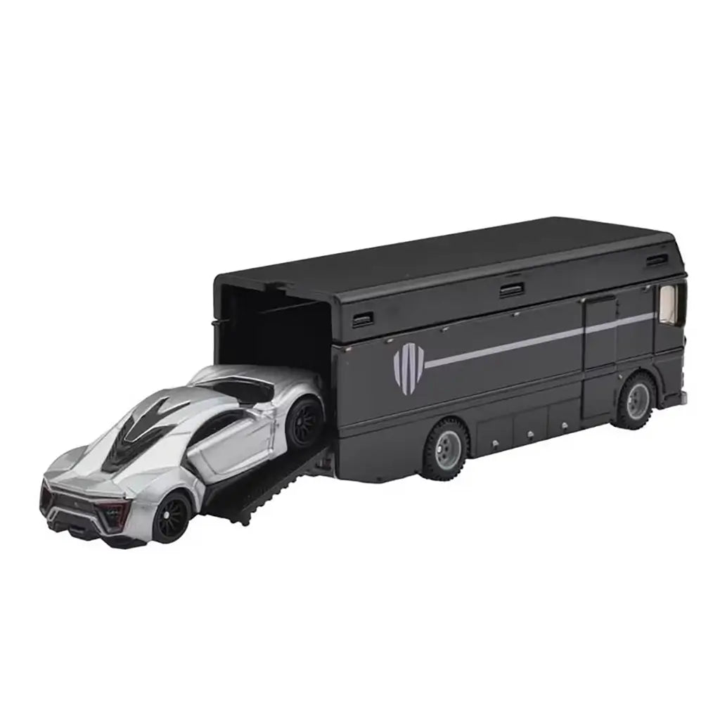 Hot Wheels Lykan Hypersport in metallic silver rolls down the ramp of the black Euro Hauler, highlighting detailed 1:64-scale die-cast design and smooth-loading transport features.