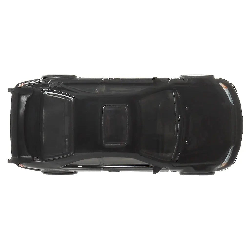 Hot Wheels Honda Civic diecast car in glossy black metal with smooth roof panel, sunroof detail, compact coupe proportions, and subtle body lines, shown from a top-down view on a plain white background.