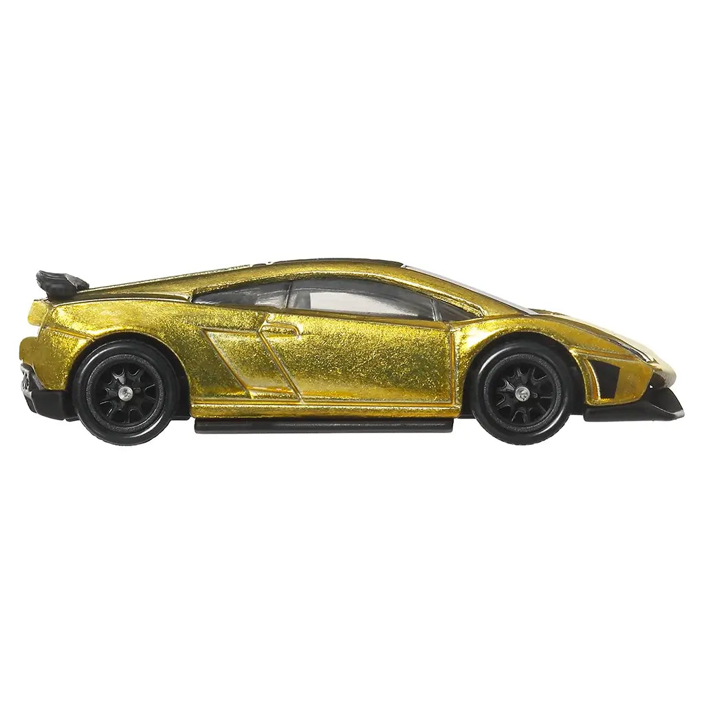 Side view of Hot Wheels Premium Lamborghini Gallardo LP 570-4 Superleggera diecast vehicle, highlighting metallic gold finish, low-slung profile, sculpted doors, black wheels, and racing-inspired stance on white.