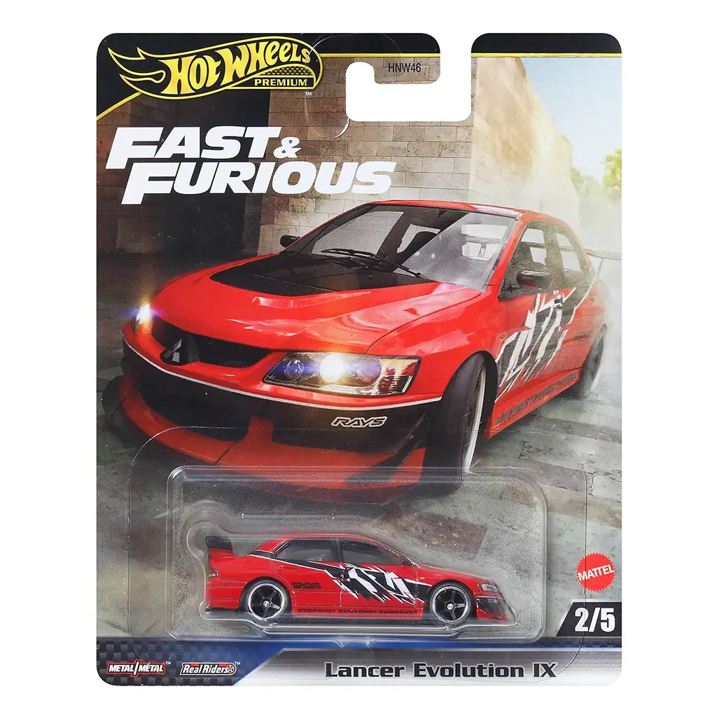 Hot Wheels Premium Fast & Furious Lancer Evolution IX packaging showing red metal diecast sedan inside a clear blister, bold movie card art, Fast & Furious branding, vehicle name text, and urban action background for retail display.
