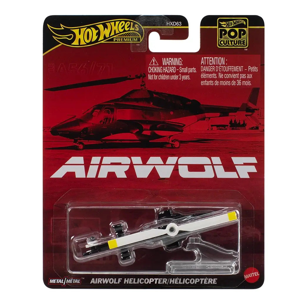Hot Wheels Premium Pop Culture Airwolf helicopter package front with red card backing and clear plastic blister, displaying the Airwolf helicopter, bold series title, warning text, Mattel branding, and Metal/Metal collectible details.