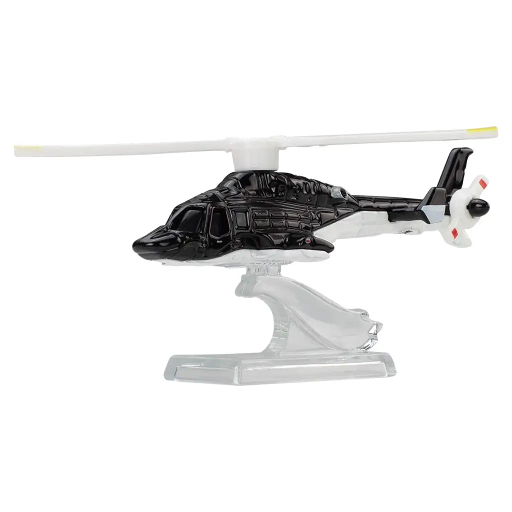 Hot Wheels Premium Airwolf helicopter featuring a black and white die-cast metal body, smooth military-style fuselage, slim landing skids, and rotating main rotor, designed as a Pop Culture TV series collectible on a white background.