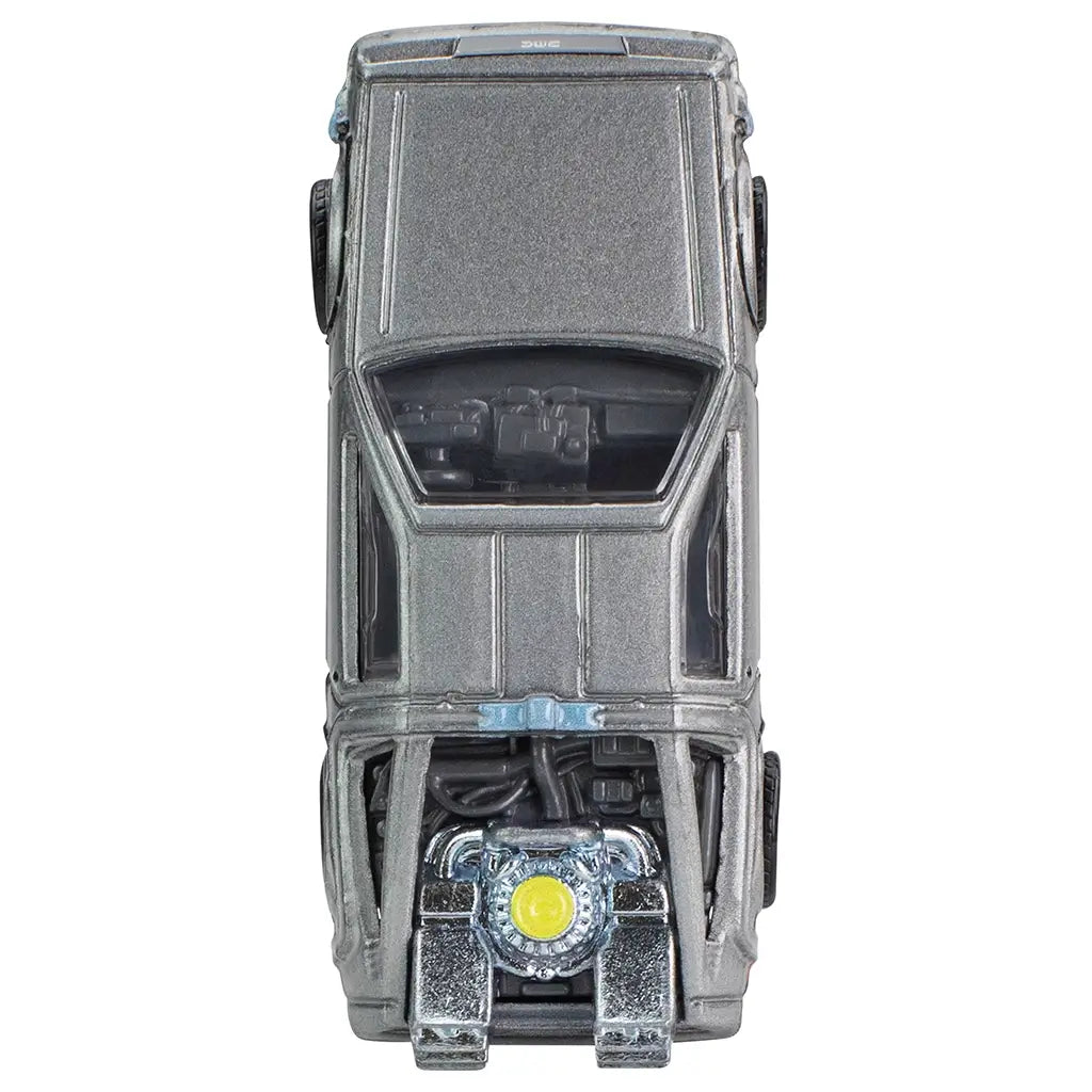 Overhead view of silver Hot Wheels Back to the Future DeLorean, showing gullwing door roof lines, front hood details, and intricate rear flux engine assembly.