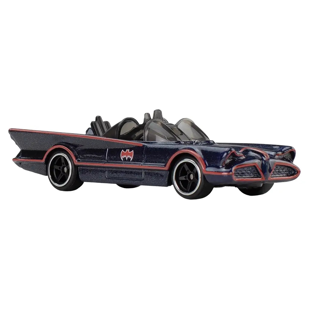 Hot Wheels Premium Batmobile 1966 Classic TV Series angled view showing dark blue metallic die-cast finish, exposed cockpit, red trim accents, black wheels, and iconic bat logos, highlighting collectible detail on white.