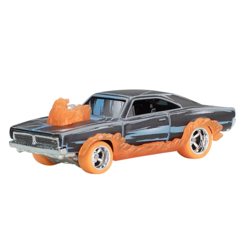 Hot Wheels Premium Ghost Rider Charger die-cast car in black with blue streaks, chrome wheels, and vivid orange flame details on tires and hood for a dynamic display look.