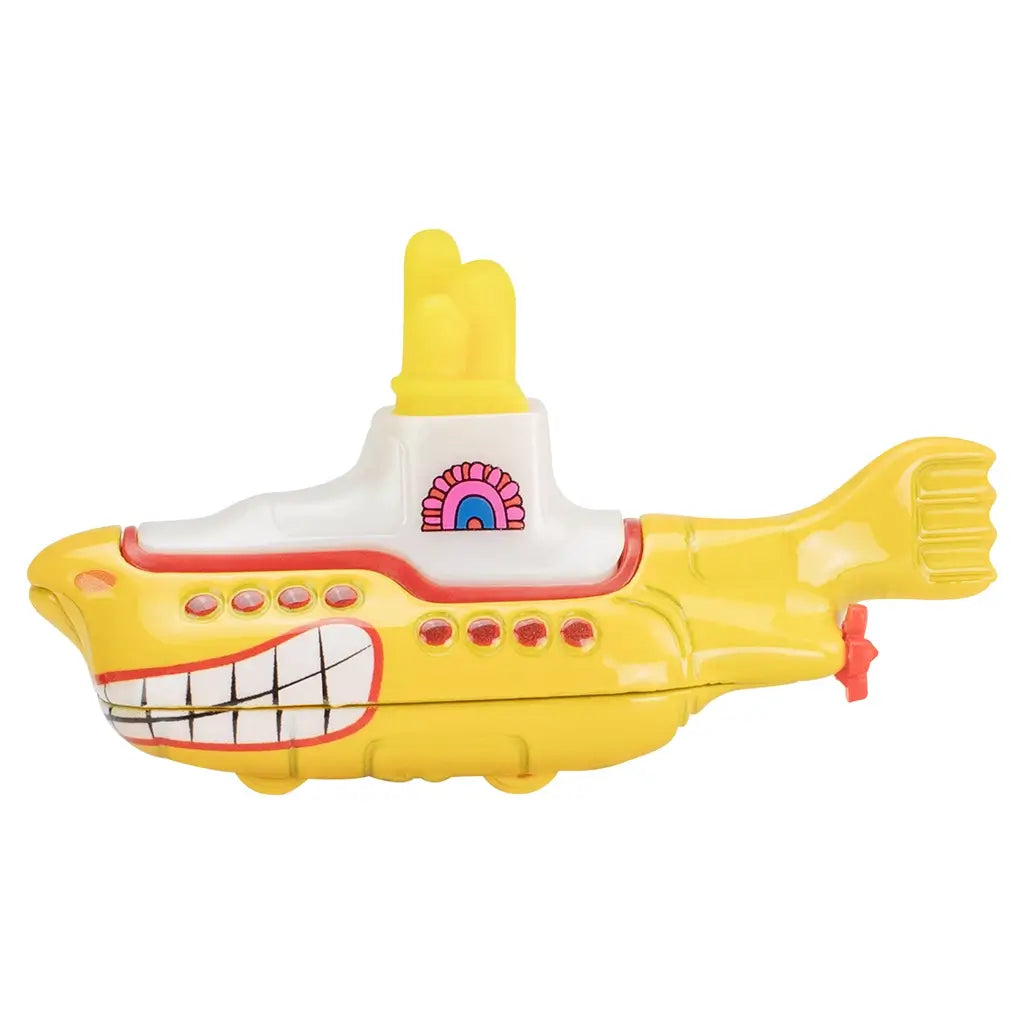 Side profile of Hot Wheels Beatles Yellow Submarine toy, featuring bright yellow hull, cartoon smile design, red portholes, white conning tower, and rear tail fin.