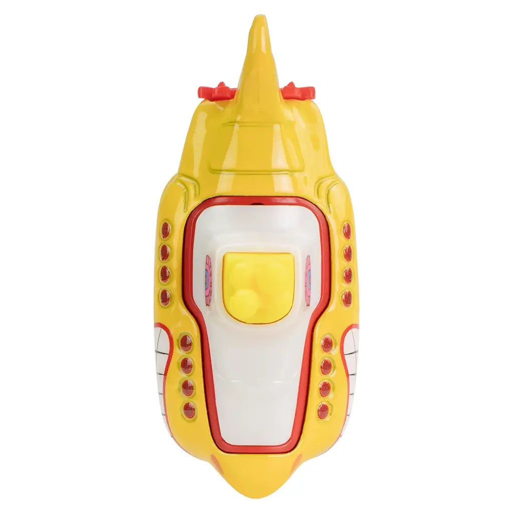 Top view of Hot Wheels Beatles Yellow Submarine toy showing white conning tower, yellow details, red portholes along both sides, and symmetrical bow-to-stern layout.