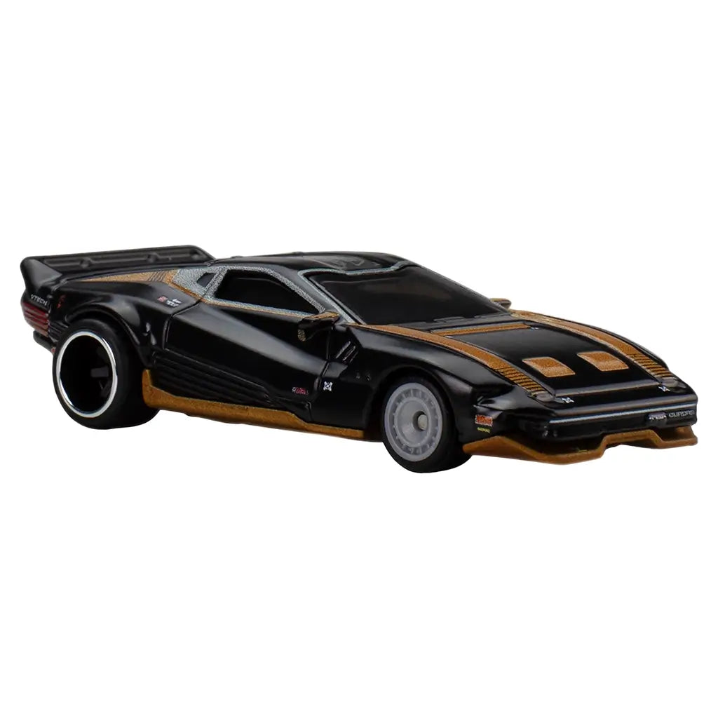 Hot Wheels Premium Quadra Turbo-R V-Tech shown in angled view, featuring black metal body with gold striping, sculpted side intakes, rear spoiler, and Real Riders wheels designed for display and collecting.