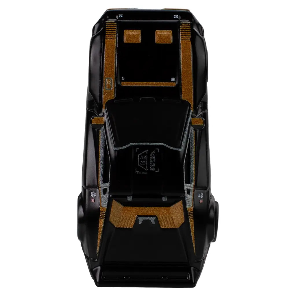 Hot Wheels Premium Quadra Turbo-R V-Tech top view highlighting black roof panels, gold graphic accents, sculpted vents, and symmetrical detailing across the hood and rear deck.
