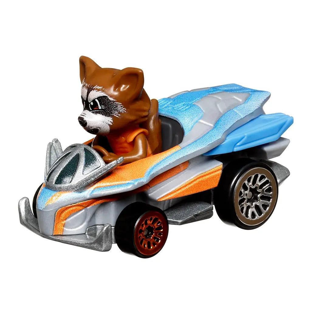 Close-up angled view of Hot Wheels RacerVerse Rocket Raccoon diecast car, silver and orange body with blue trim, detailed raccoon driver molded into cockpit seat.