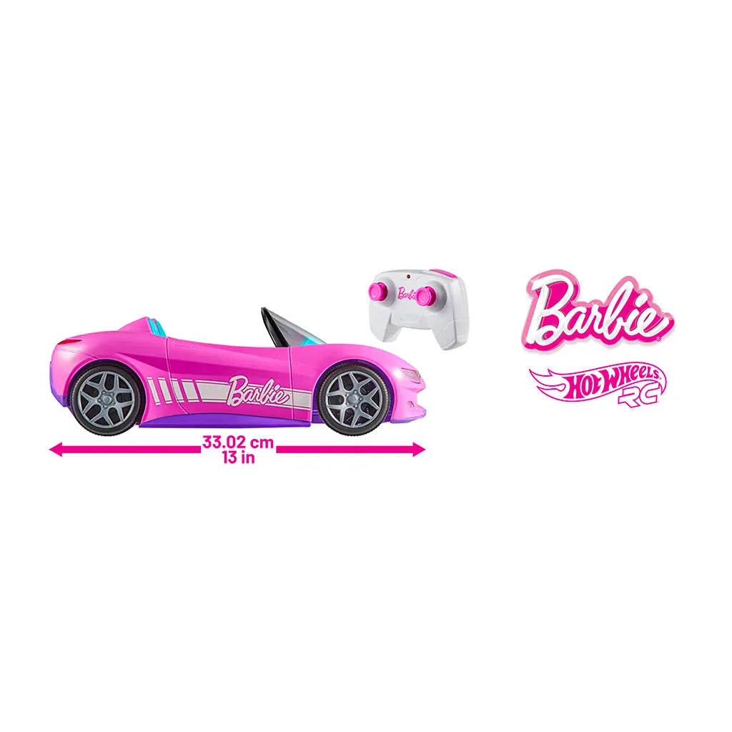 Side view of Barbie RC convertible car in pink with silver wheels, white remote control, and size measurement of 13 inches, showing official Barbie and Hot Wheels logos.