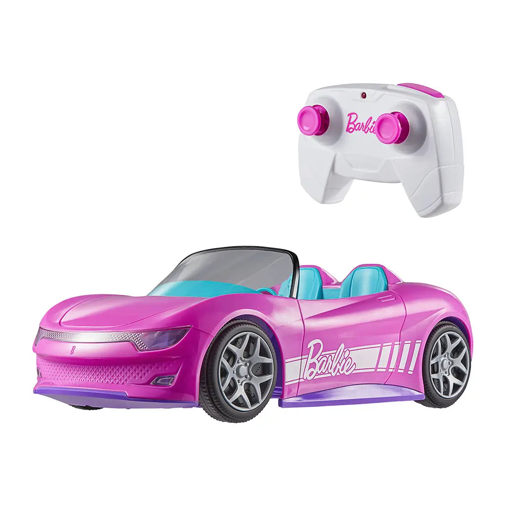 Barbie RC convertible in metallic pink with teal seats and silver wheels, paired with a white and pink two-stick remote control on plain white background.