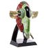 Hot Wheels Star Wars Boba Fett’s Starship collectible featuring green and red weathered plastic panels, rounded vertical hull shape, and mounted laser cannons, displayed upright on a black branded stand against a white background.
