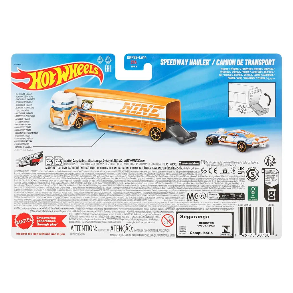 Hot Wheels Speedway Hauler packaging back view with blue card backing, product illustrations, safety warnings, multilingual text, barcodes, and brand information arranged across the layout.